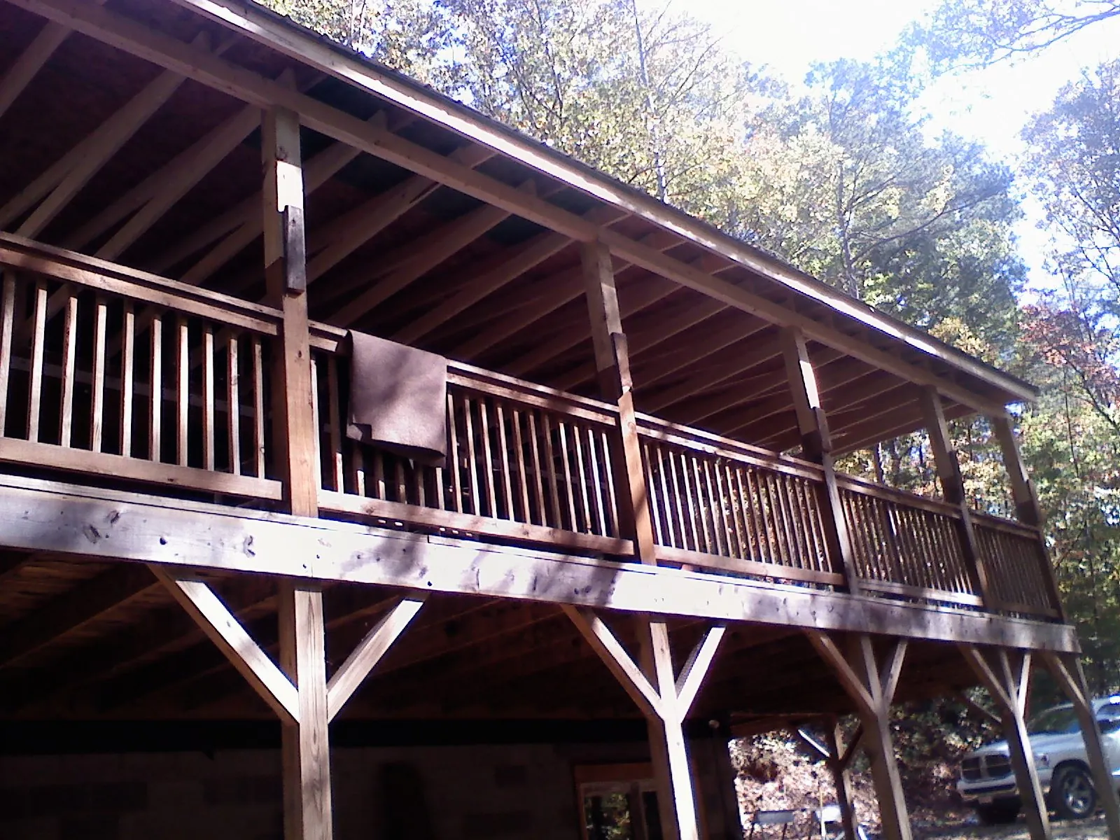 Timber framing under a new elevated porch and deck — Roof Leak Repair in Drewsville by Roofing Brothers